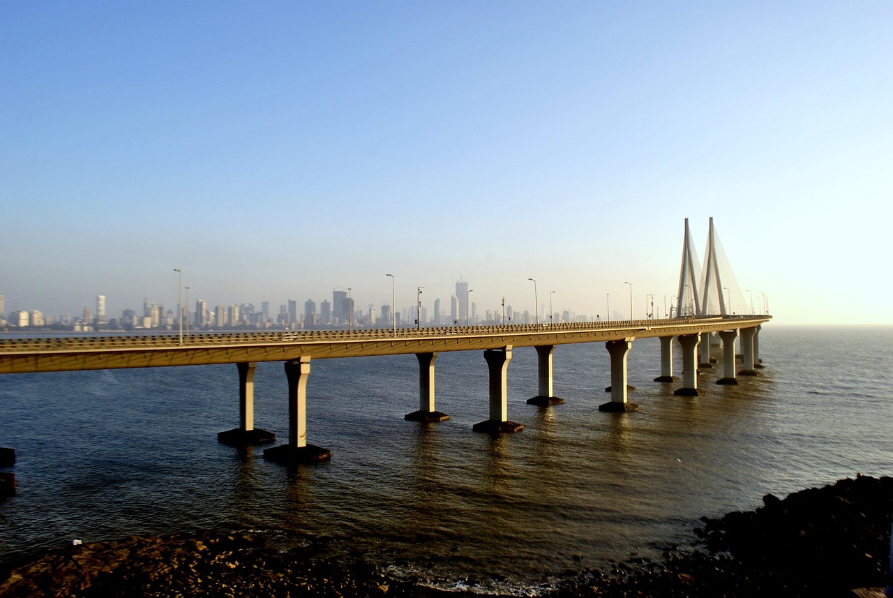 The Bandra-Worli Sea Link at golden hour with the Mumbai skyline behind it