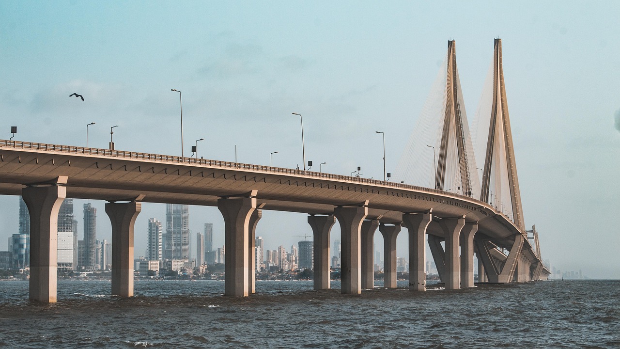 The cable-stayed Sea Link with high-rise towers rising behind it
